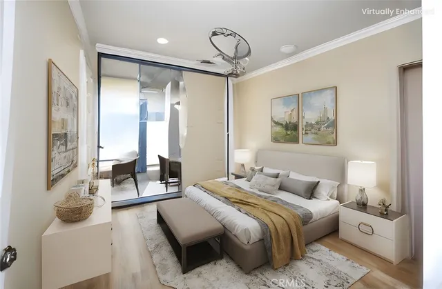 a bedroom with furniture and a large mirror