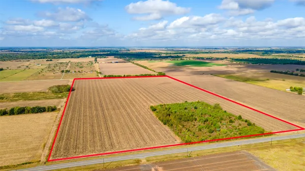 a view of swimming pool with a yard
