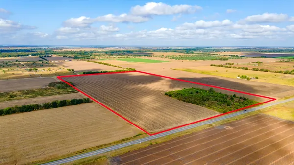 a view of swimming pool with an outdoor seating yard and ocean view