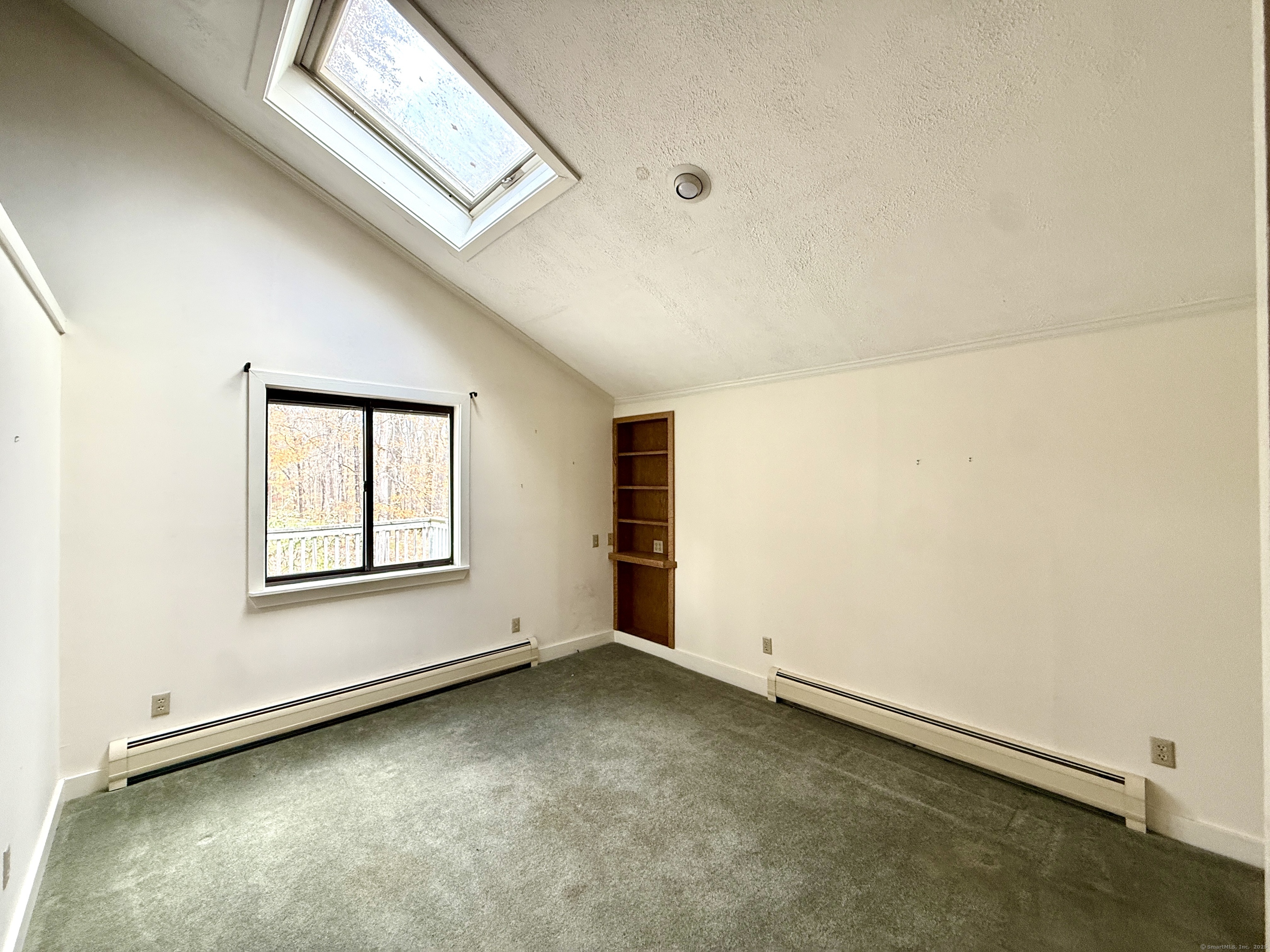 102 Krapf Road Ashford, CT 06278 - Photo 23 of 39 an empty room with a empty space and windows