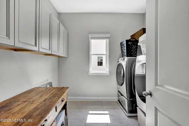 a storage room with washer and dryer