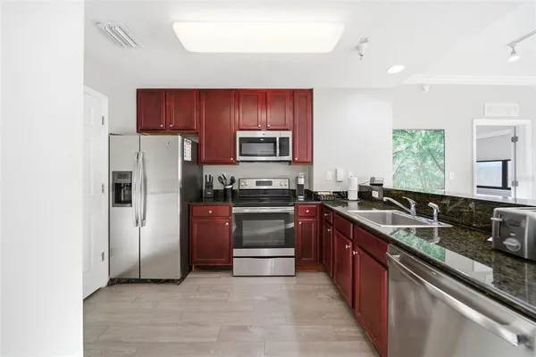 $215,000 | 14051 Grove Resort Avenue, Unit 1705, Winter Garden, FL 34787