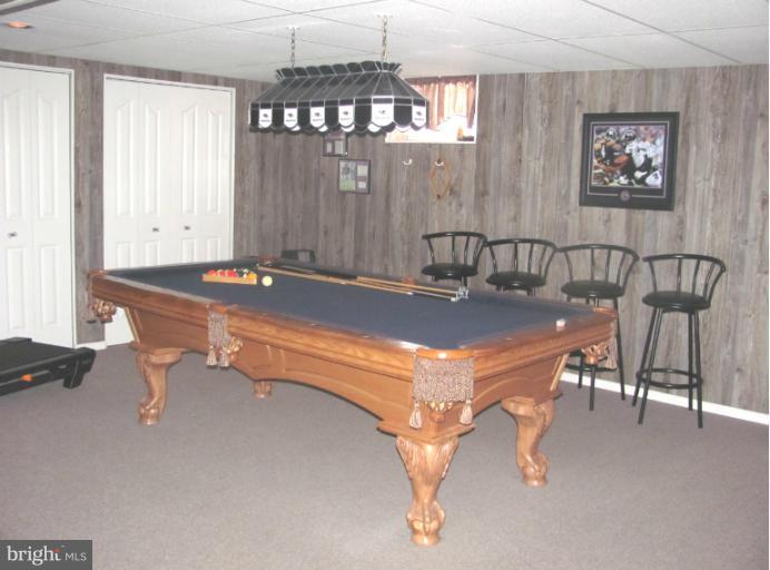 7952 Tick Neck Road Pasadena, MD 21122 - Photo 11 of 27 a room with pool table and windows