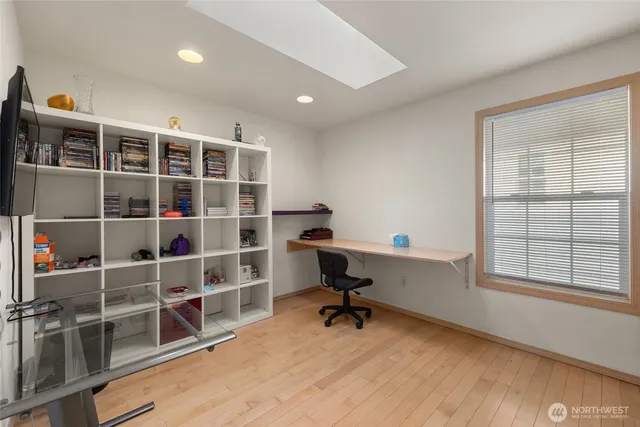 a view of a workspace with furniture