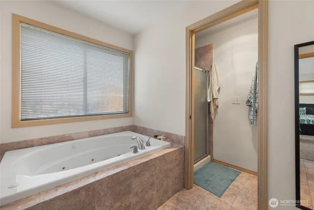 a view of multiple houses with a big yard