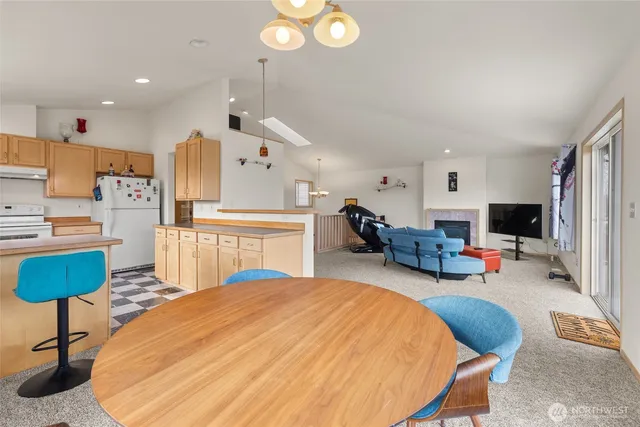 a living room with furniture and a table