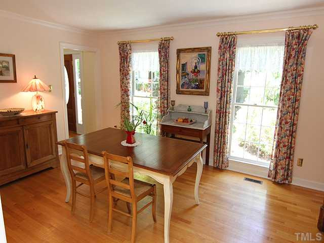 8616 Harbor Drive Raleigh, NC 27615 - Photo 5 of 25 Living Room 17.0x11.3 with Large Windows and Hardwood Floor Opens to Foyer and Dining Room. Owner Currently Enjoys this Area as a Spacious Dining Room. Lots of Natural Light! Living Room
