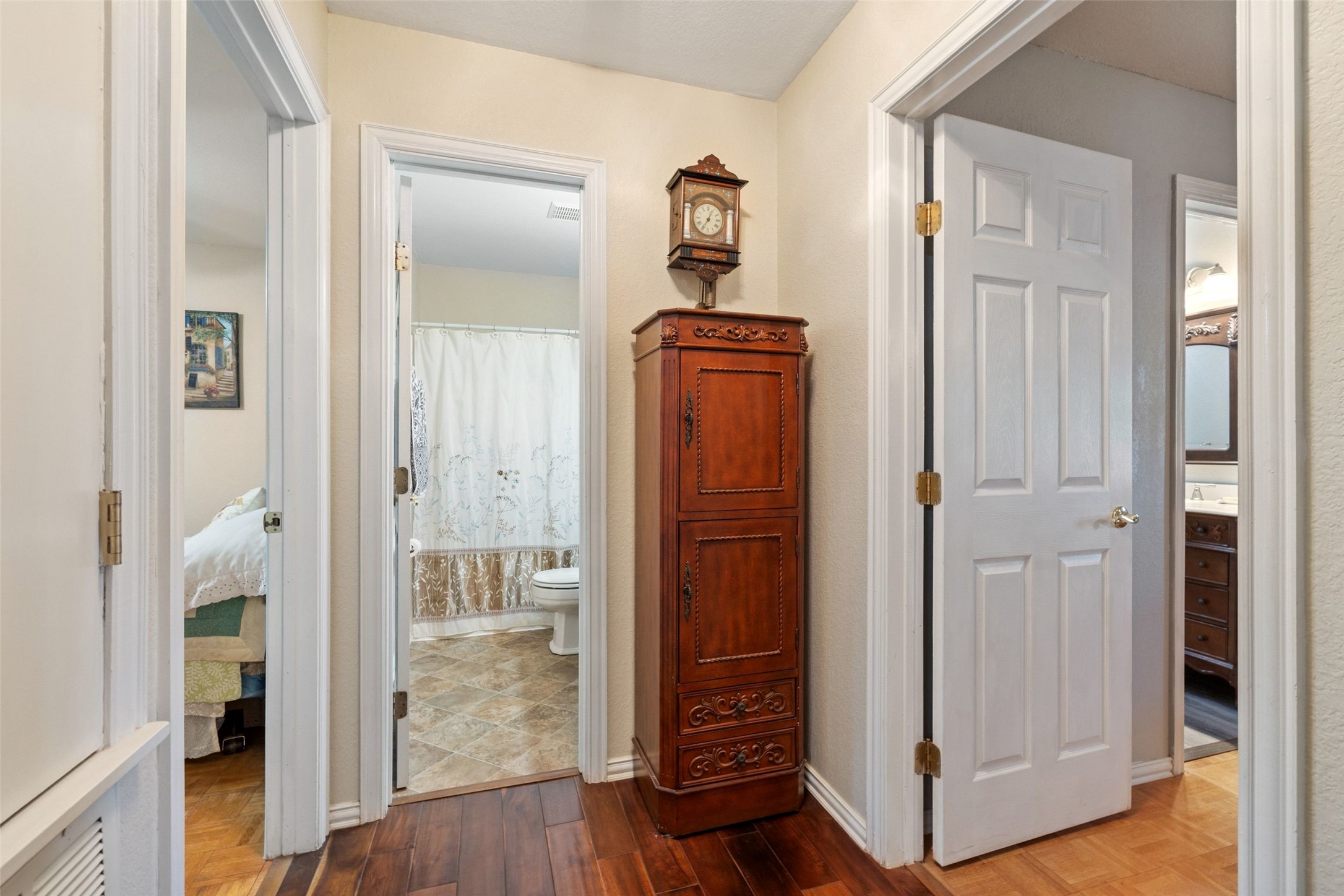 399 Upper Elgin River Road Elgin, TX 78621 - Photo 14 of 39 Hallway featuring dark wood-style floors and baseboards