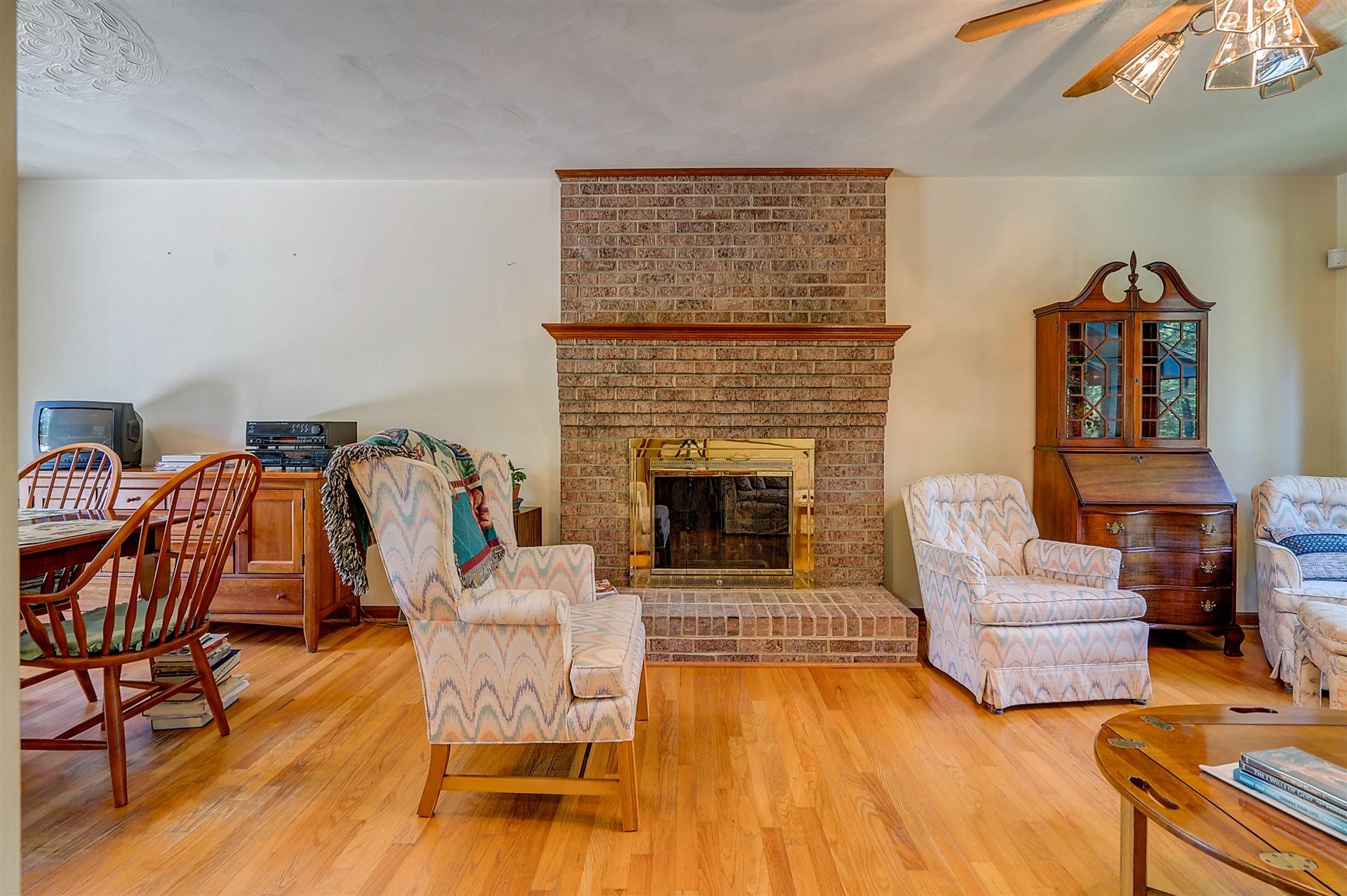 935 Altice Mill Road Rocky Mount, VA 24151 - Photo 13 of 34 a living room with furniture and a fireplace