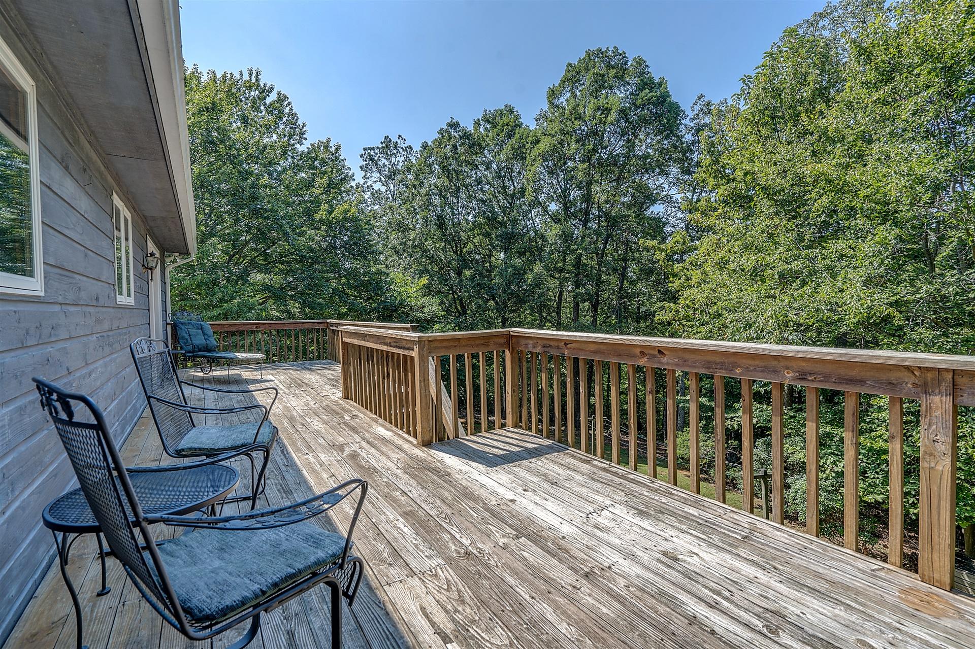 935 Altice Mill Road Rocky Mount, VA 24151 - Photo 18 of 34 a view of a two chairs on the roof deck