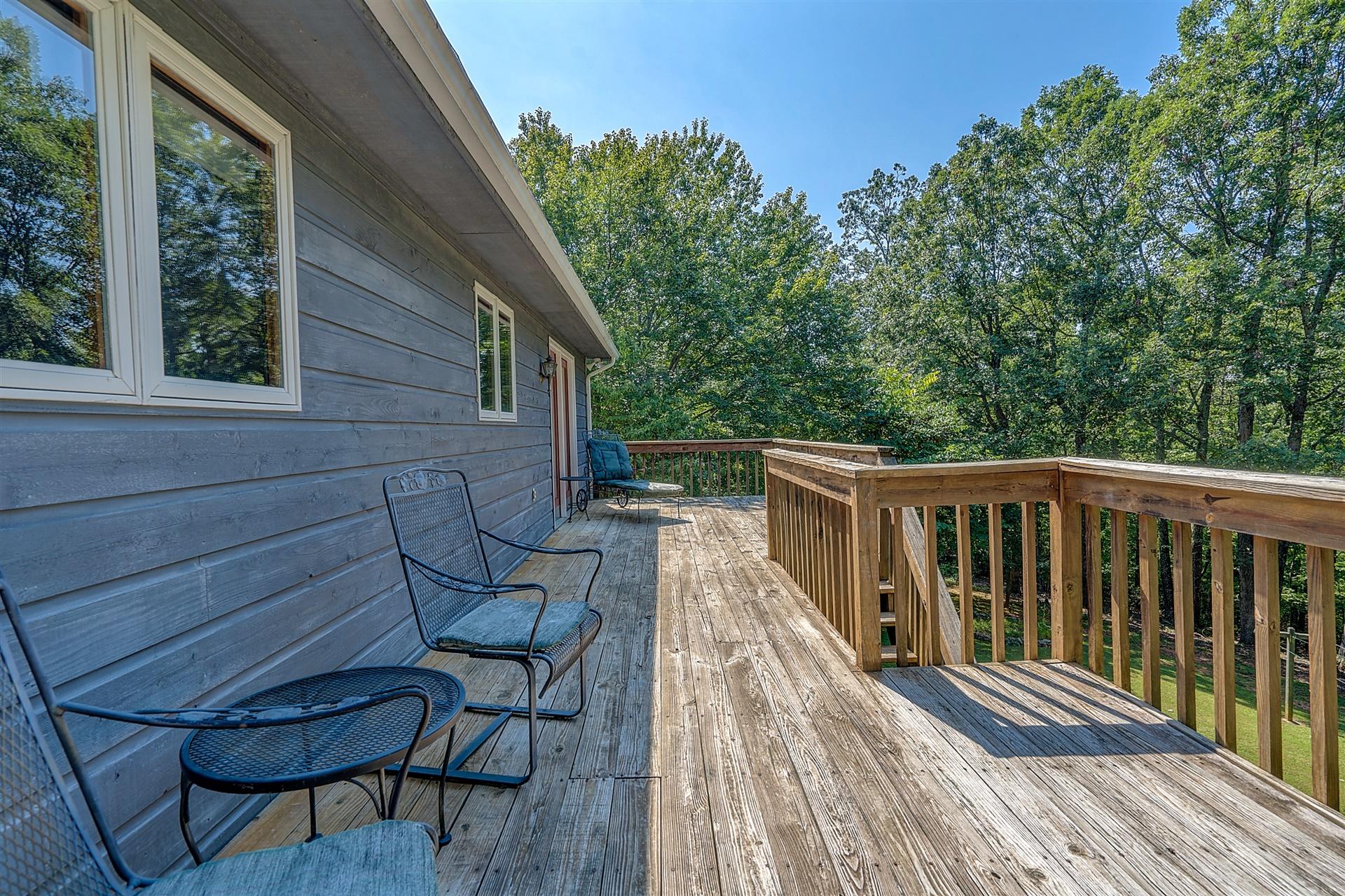 935 Altice Mill Road Rocky Mount, VA 24151 - Photo 19 of 34 a view of a two chairs in the balcony