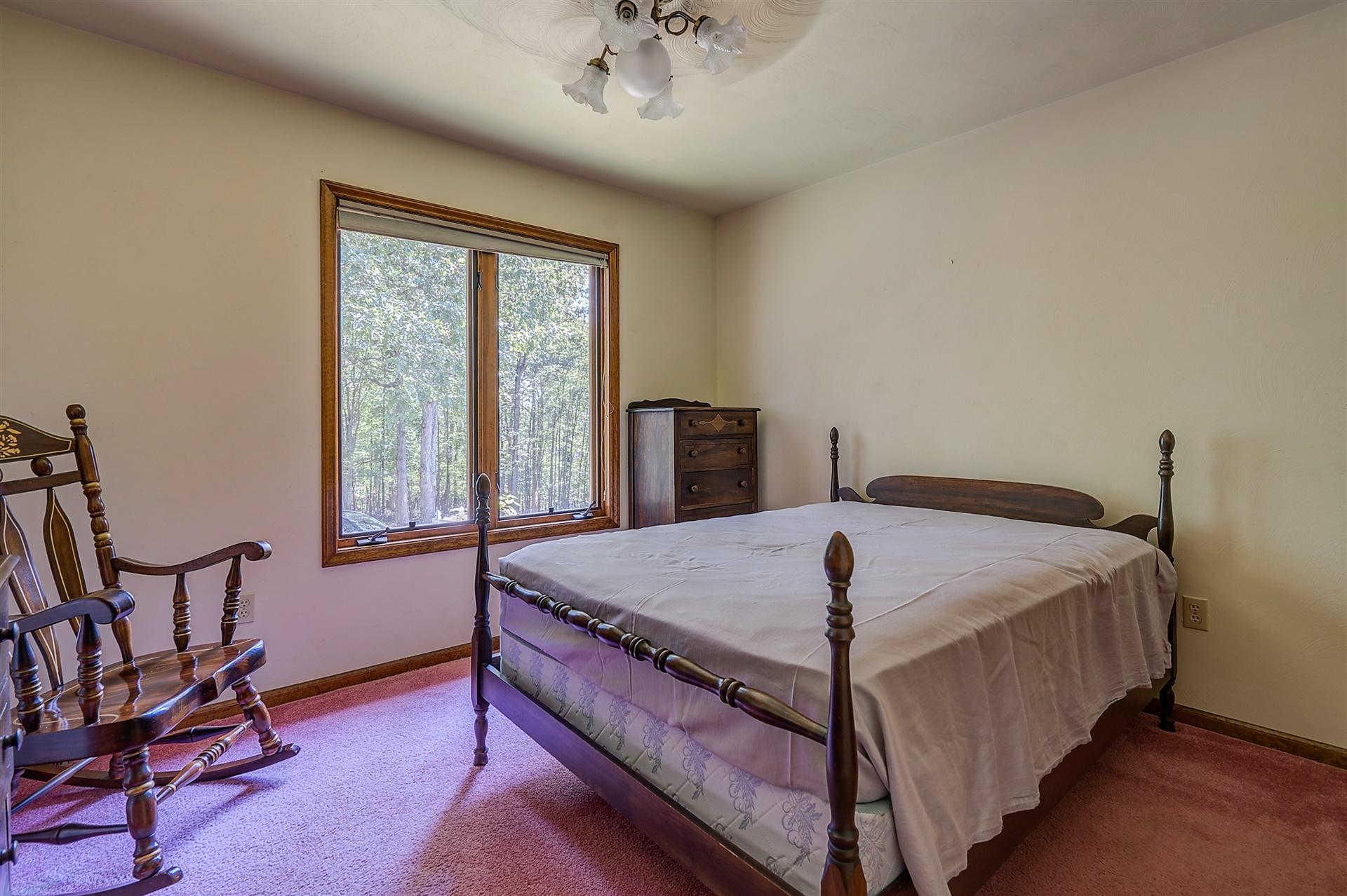 935 Altice Mill Road Rocky Mount, VA 24151 - Photo 23 of 34 a bedroom with bed and a window