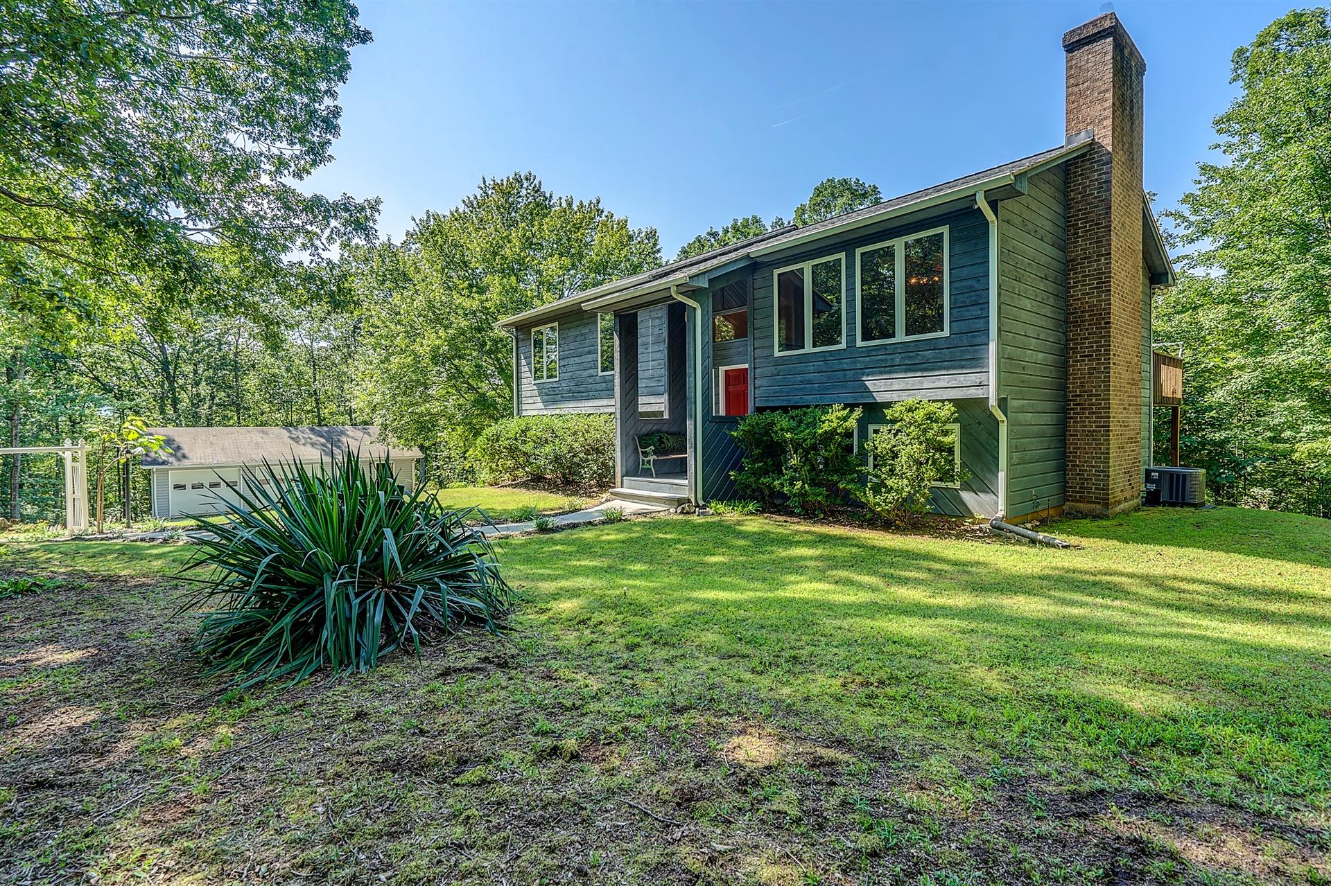 935 Altice Mill Road Rocky Mount, VA 24151 - Photo 4 of 34 a view of a house in front of a yard with plants and trees