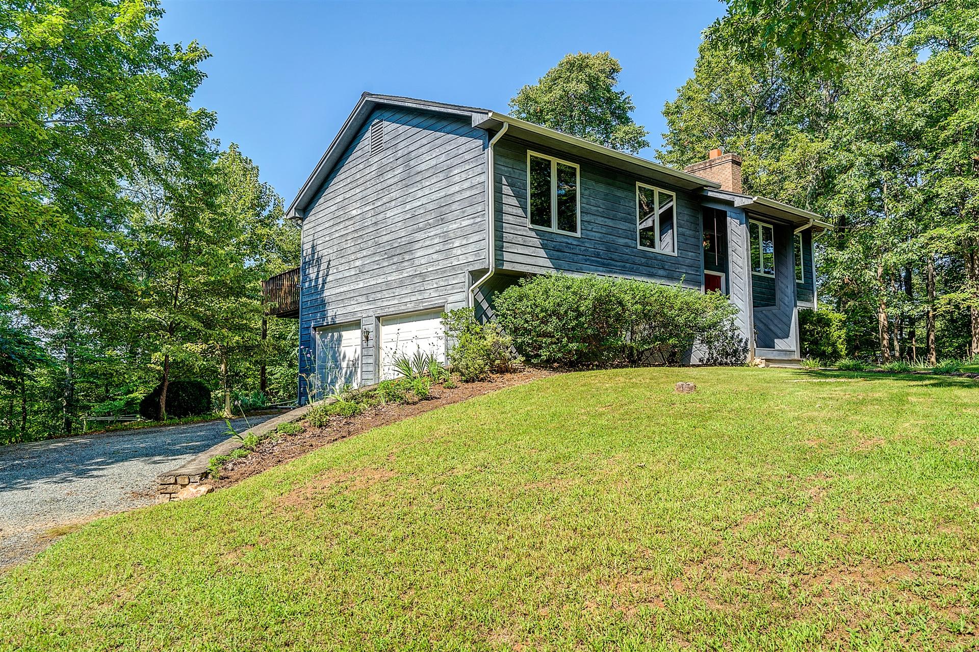 935 Altice Mill Road Rocky Mount, VA 24151 - Photo 31 of 34 a front view of a house with a yard