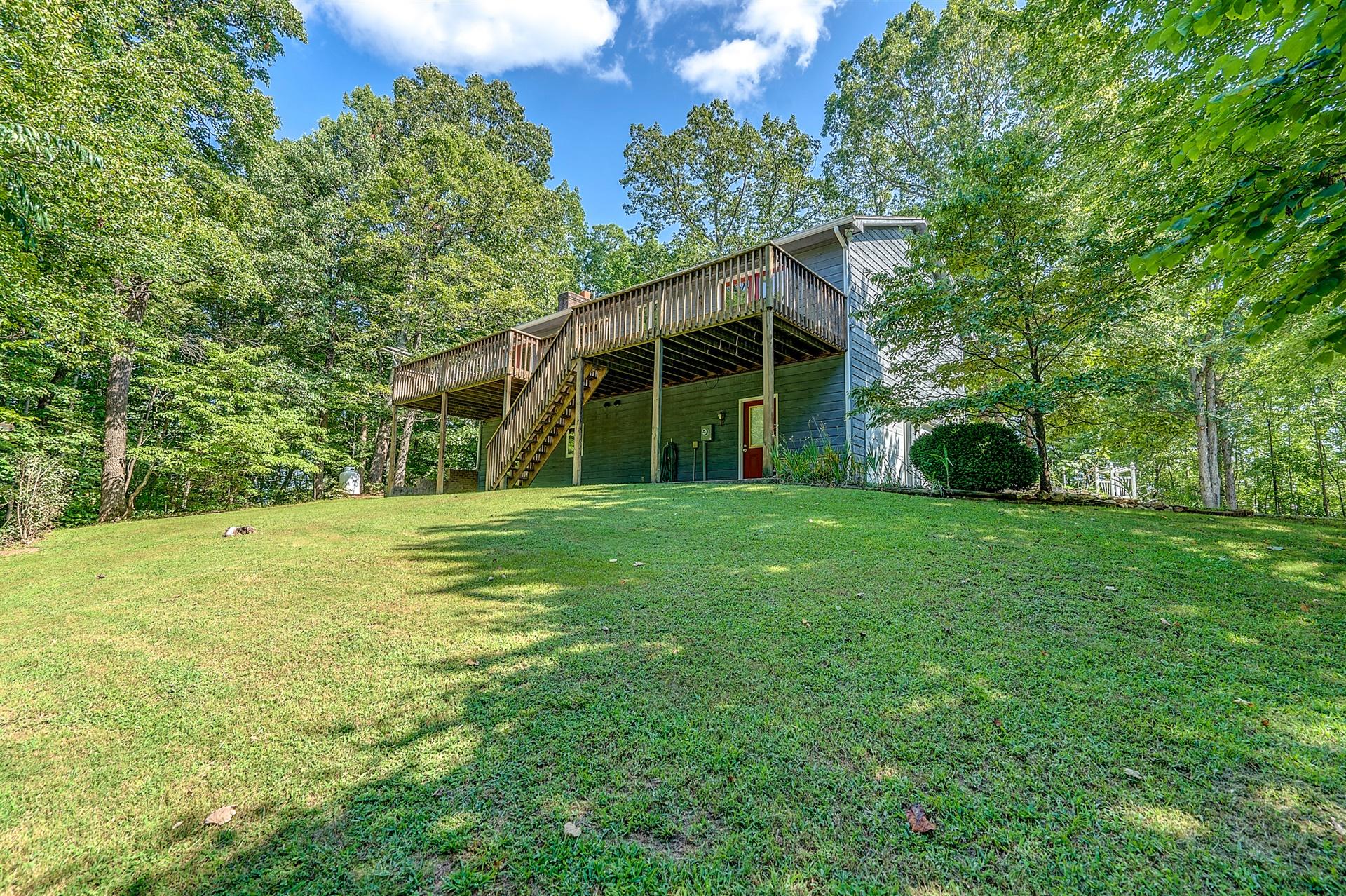 935 Altice Mill Road Rocky Mount, VA 24151 - Photo 32 of 34 a view of a house with a yard