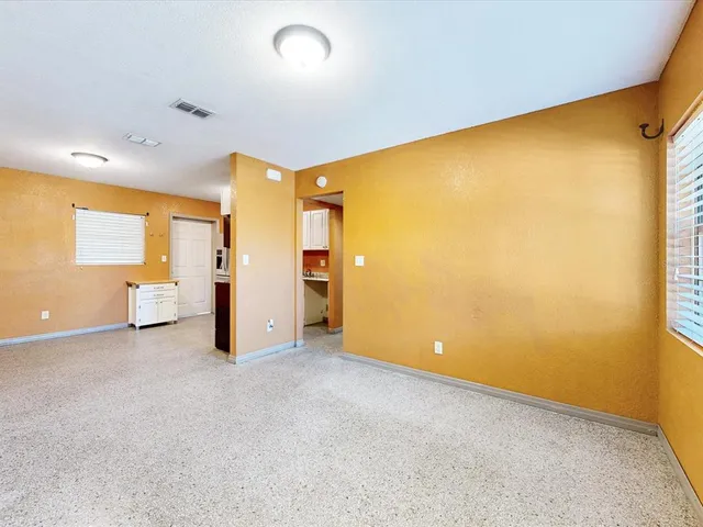 an empty room with a door