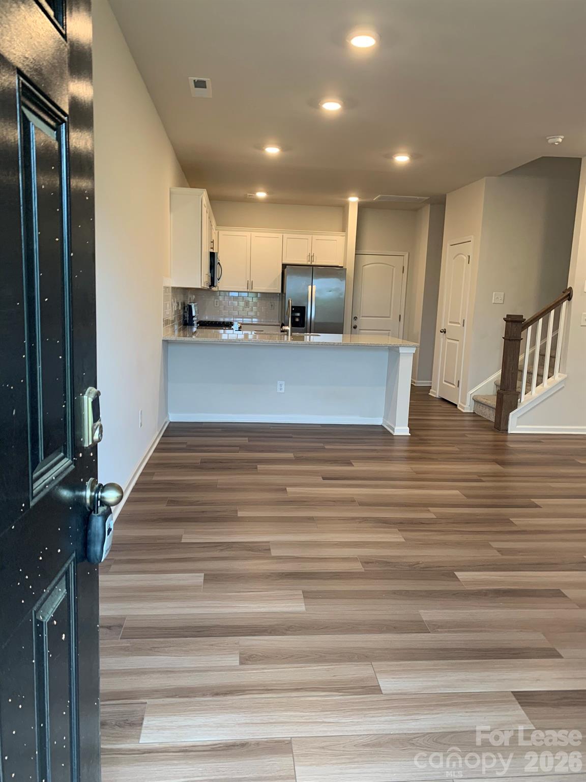 2143 Stevens Mill Road Matthews, NC 28104 - Photo 2 of 39 a view of kitchen with furniture and refrigerator