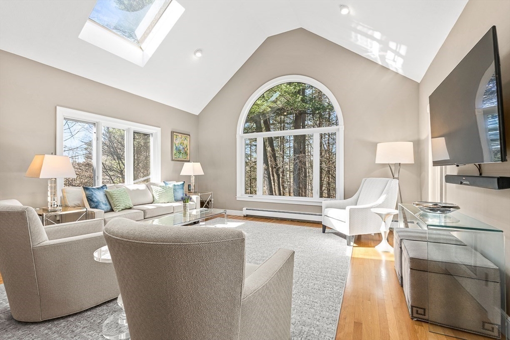 359 Grove Street Needham, MA 02492 - Photo 12 of 37 a living room with furniture and a large window