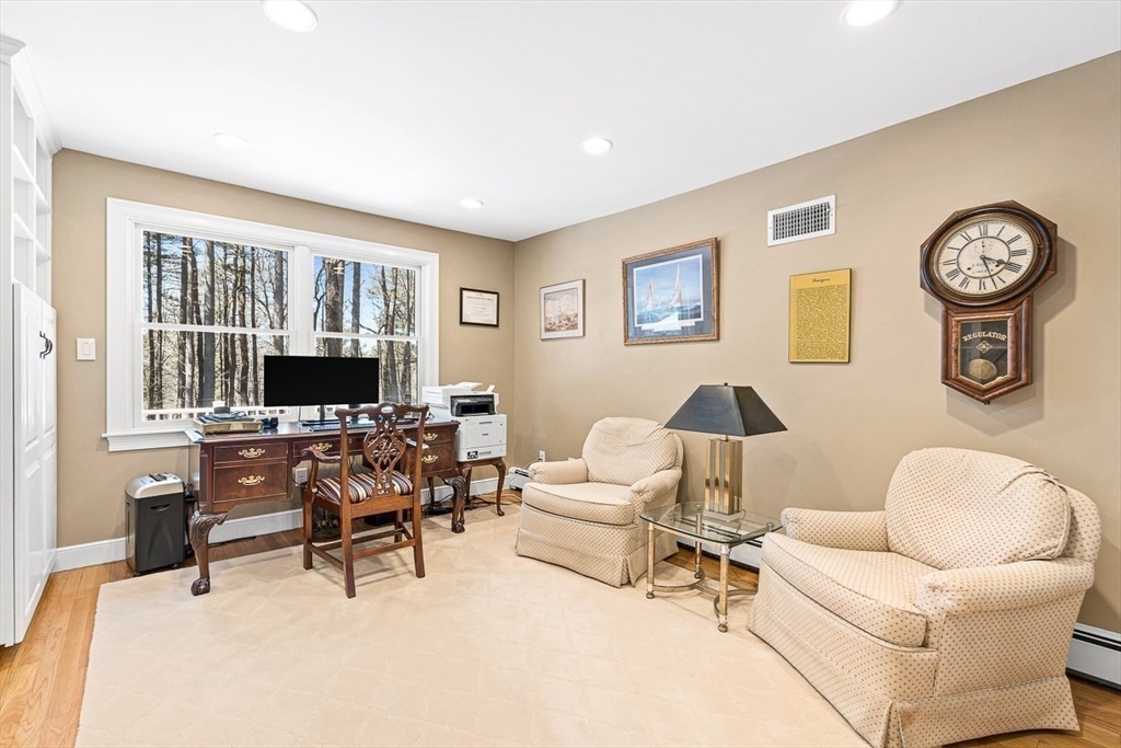 359 Grove Street Needham, MA 02492 - Photo 18 of 37 a living room with furniture and a flat screen tv