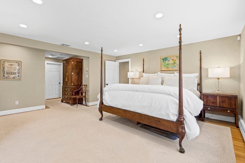 359 Grove Street Needham, MA 02492 - Photo 21 of 37 a bed room with a bed and a tv