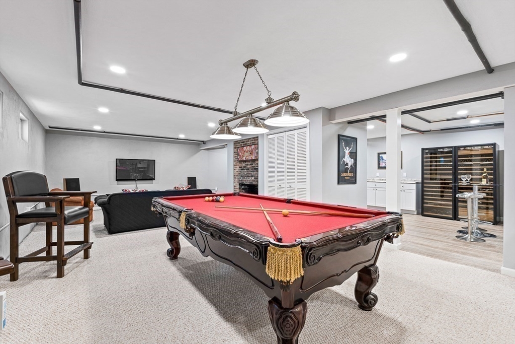 359 Grove Street Needham, MA 02492 - Photo 32 of 37 a living room with a table tennis pool table and furniture