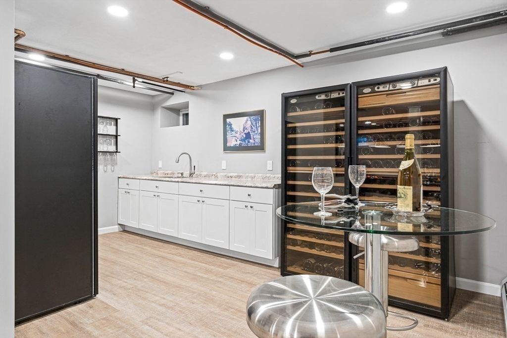 359 Grove Street Needham, MA 02492 - Photo 33 of 37 a kitchen with a refrigerator and a sink