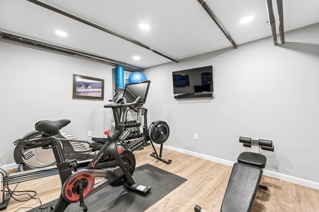 359 Grove Street Needham, MA 02492 - Photo 34 of 37 a room with gym equipment