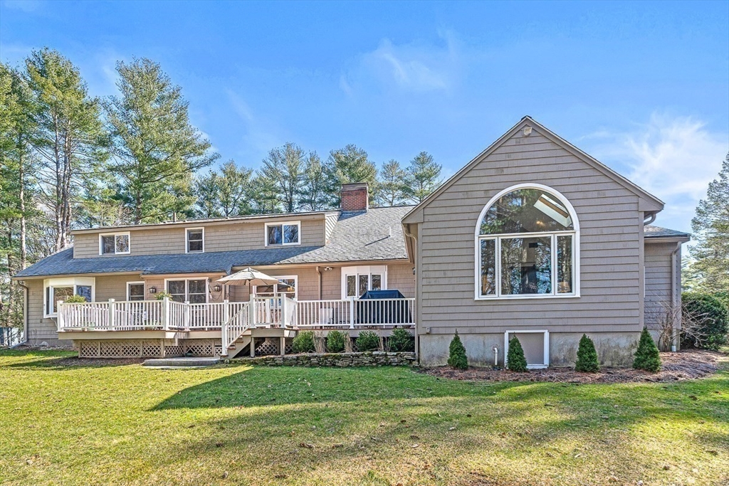 359 Grove Street Needham, MA 02492 - Photo 36 of 37 a front view of a house with a yard