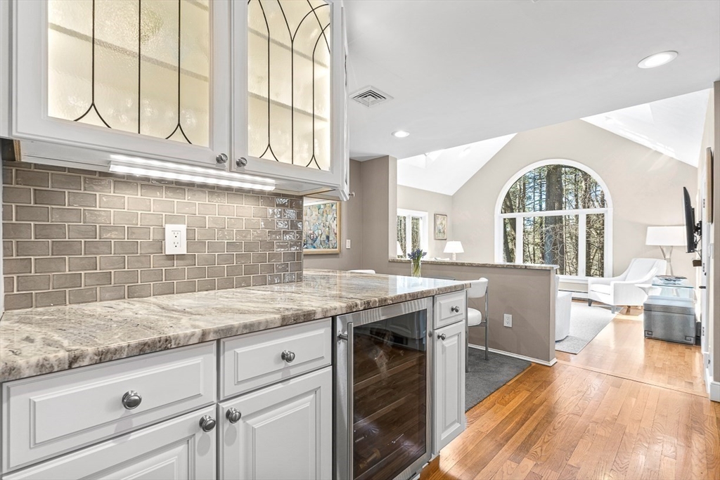 359 Grove Street Needham, MA 02492 - Photo 9 of 37 a view of a kitchen counter top space and wooden floor