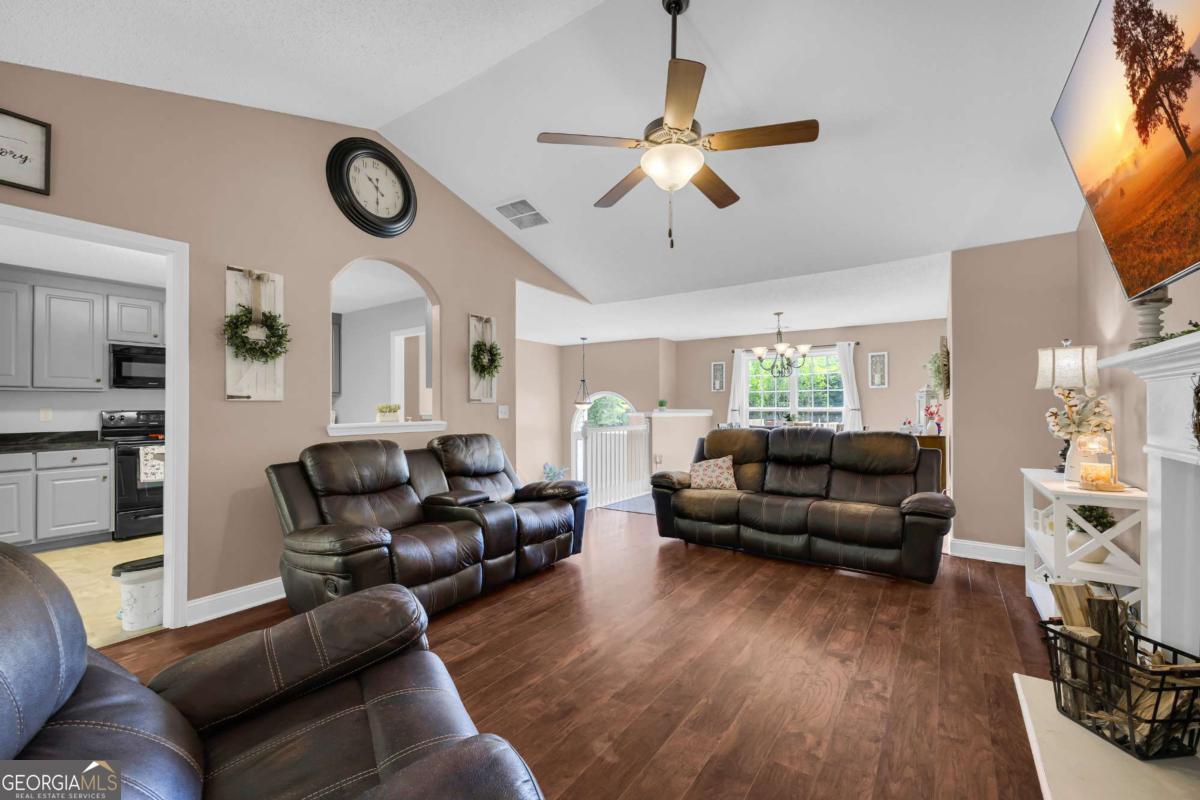 335 Elizabeth Court Colbert, GA 30628 - Photo 5 of 33 a living room with furniture kitchen view and a large window