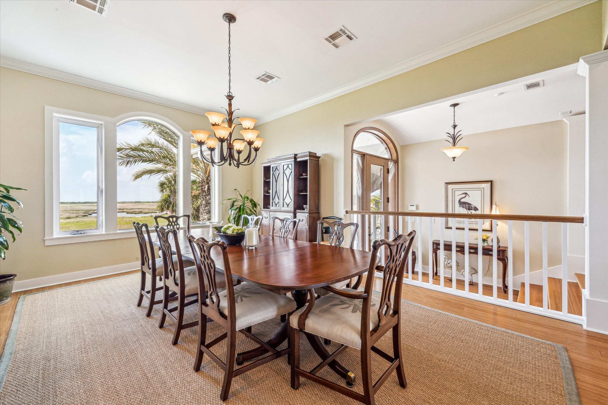 1 Shell Key Hitchcock, TX 77563 - Photo 11 of 50 a dining room with furniture a chandelier and wooden floor