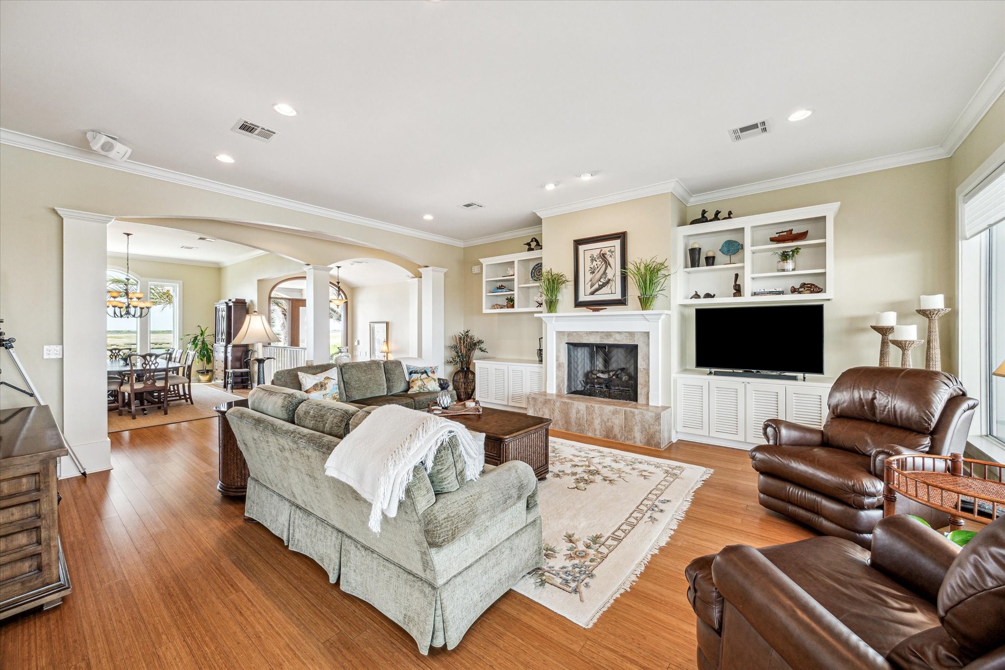 1 Shell Key Hitchcock, TX 77563 - Photo 13 of 50 a living room with furniture fireplace and a flat screen tv