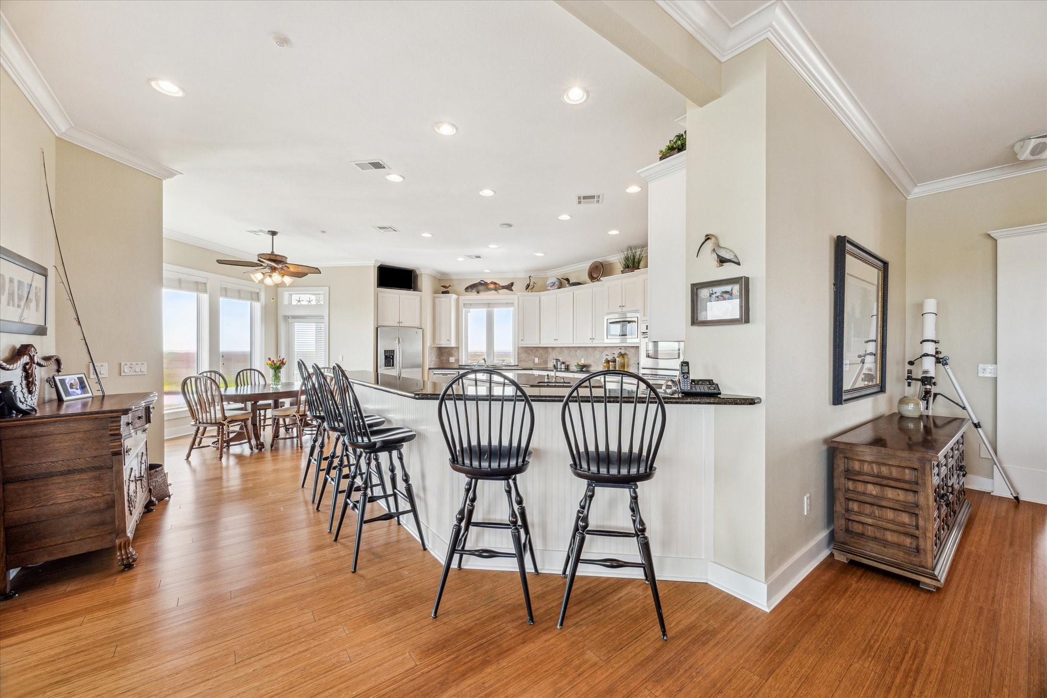 1 Shell Key Hitchcock, TX 77563 - Photo 15 of 50 a dining room with furniture wooden floor and a rug