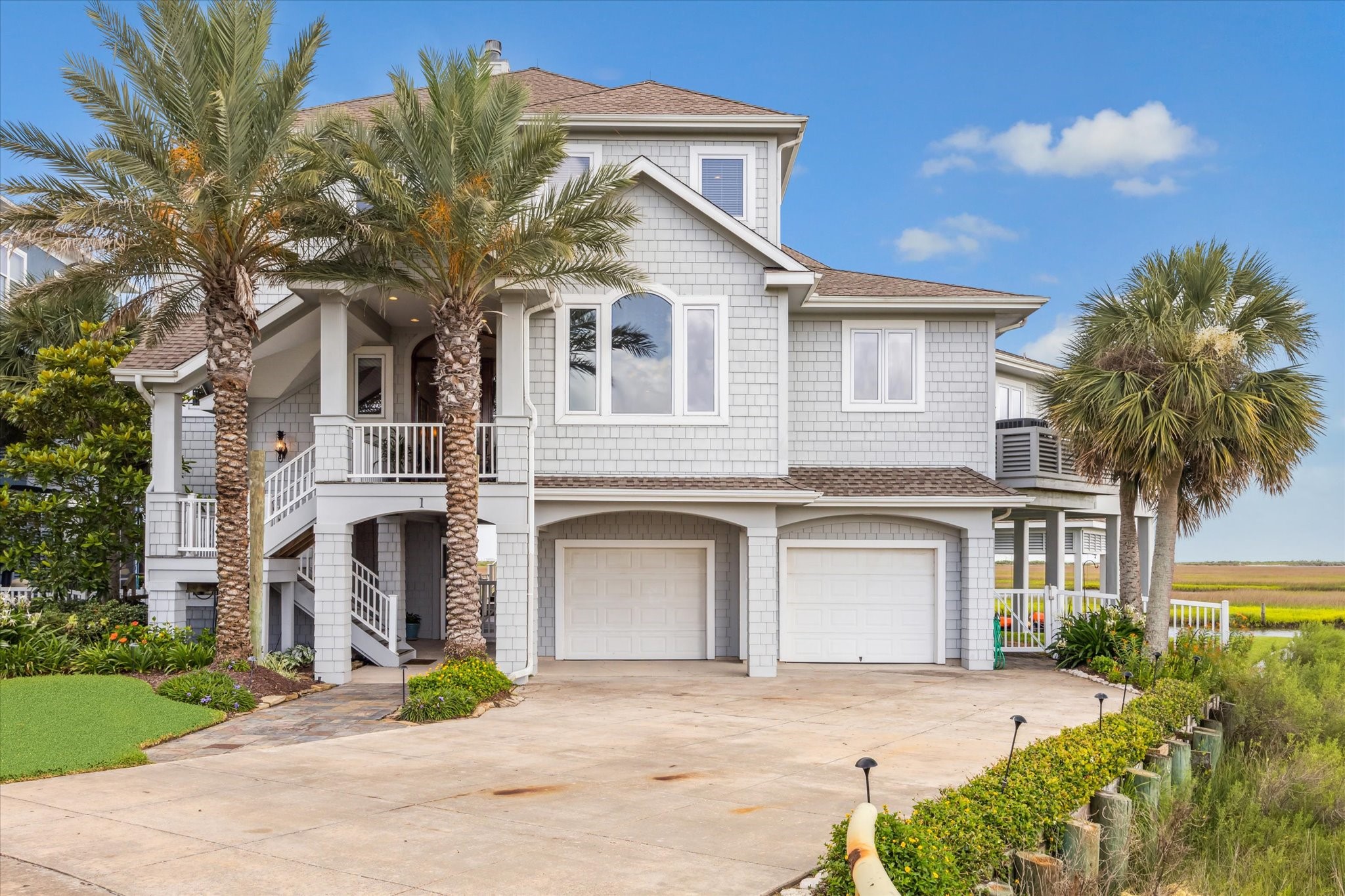 1 Shell Key Hitchcock, TX 77563 - Photo 50 of 50 This thoughtfully designed home features an expansive open floor plan with generously sized rooms and a formal dining area, perfect for both everyday living and entertaining. Built for comfort and energy efficiency, it includes impact-resistant windows, a high-efficiency HVAC system, whole-house dehumidifier, and full spray foam insulation. The exterior is clad in low-maintenance Hardie shingle siding with no-paint vinyl railings for lasting durability