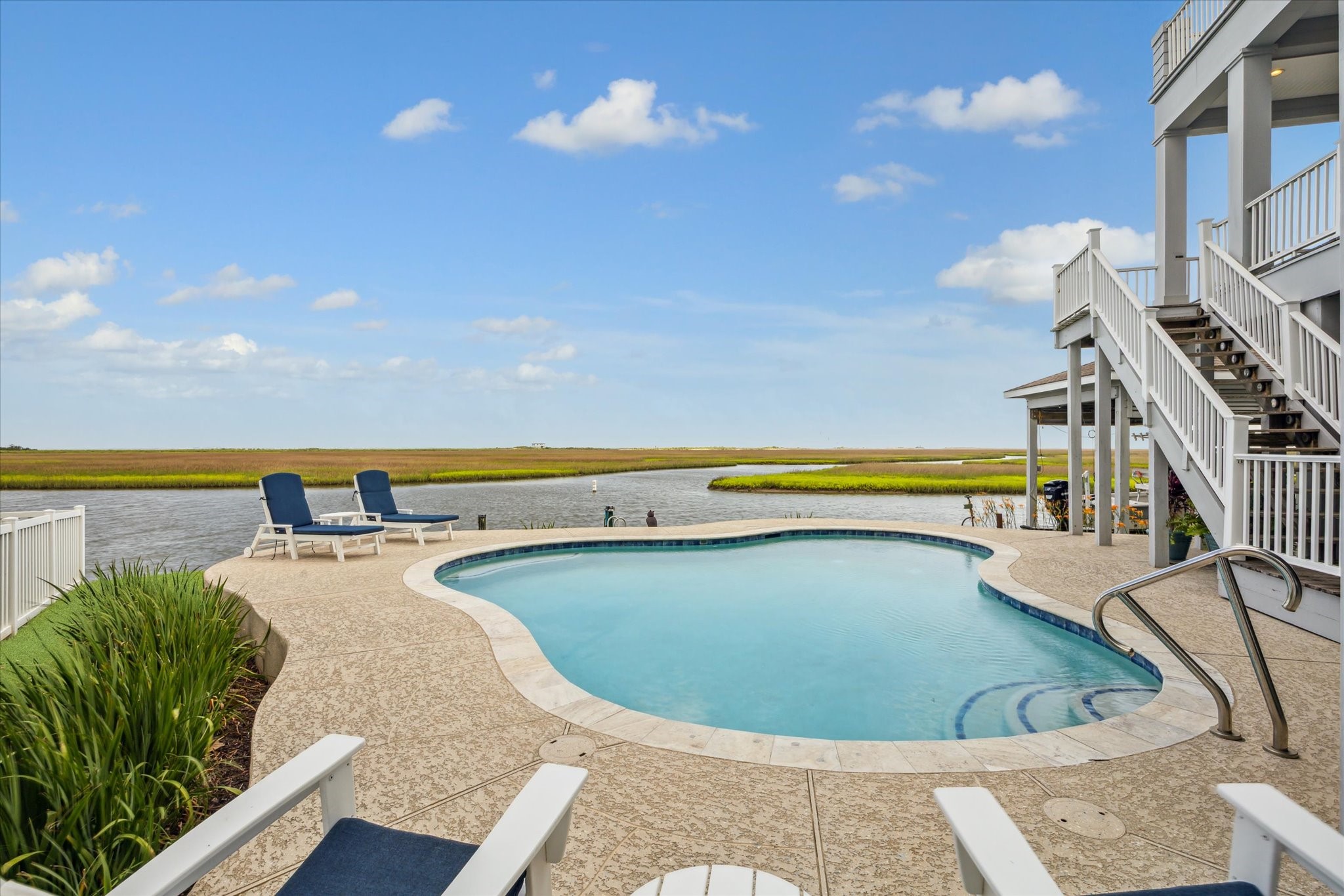 1 Shell Key Hitchcock, TX 77563 - Photo 47 of 50 a view of a swimming pool with seating area
