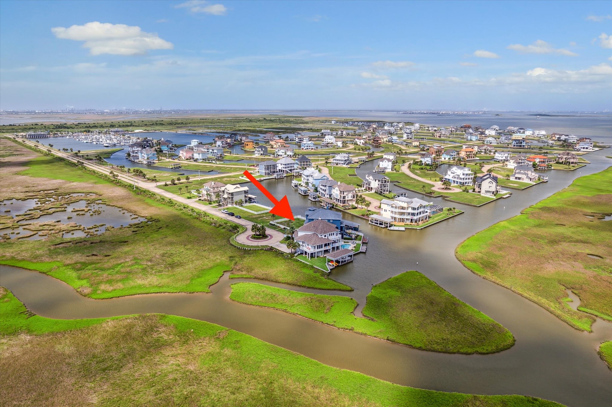 1 Shell Key Hitchcock, TX 77563 - Photo 4 of 50 One-of-a-kind 270-degree view with permanent, unobstructed vistas of West Galveston Bay, the Intracoastal Waterway, and coastal wetlands from every room in the home. Enjoy endless sunrise & sunset views from multiple balconies