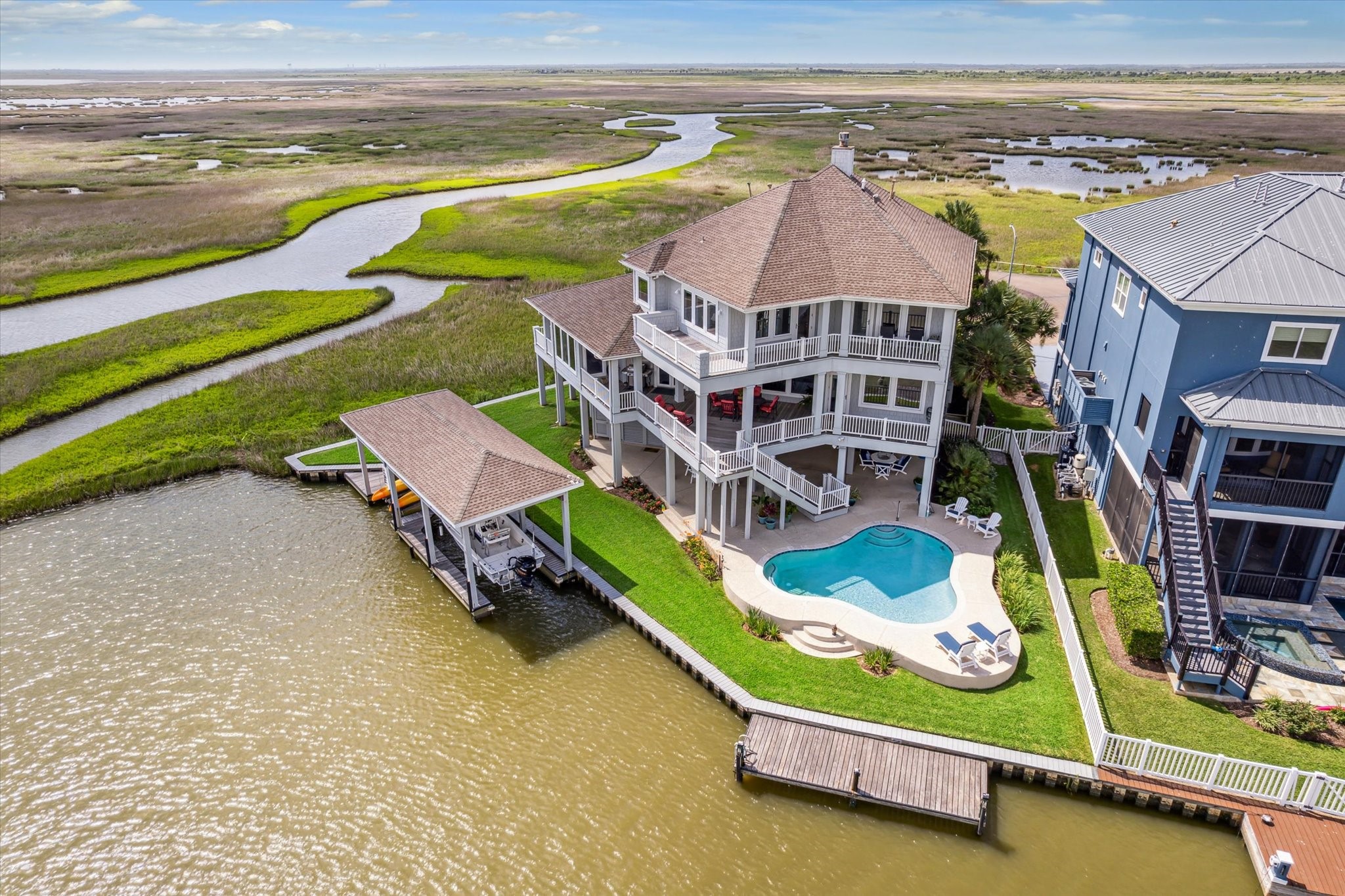 1 Shell Key Hitchcock, TX 77563 - Photo 5 of 50 swimming pool with outdoor seating and yard
