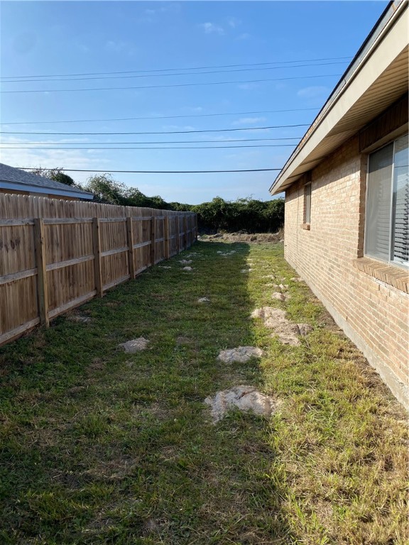 313 Easy Street, Unit A Corpus Christi, TX 78418 - Photo 14 of 16 a view of a backyard