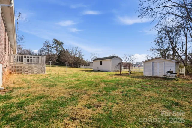 a bathroom with a sink and a yard