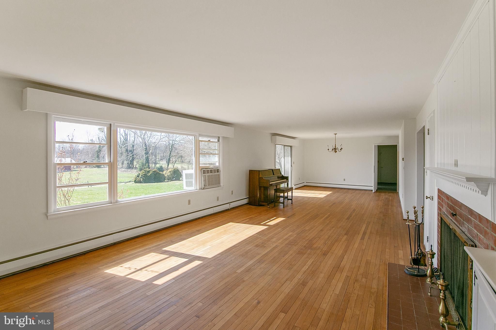 3611 Petersville Road Knoxville, MD 21758 - Photo 11 of 50 40' GREAT ROOM WITH HARDWOOD FLOORS