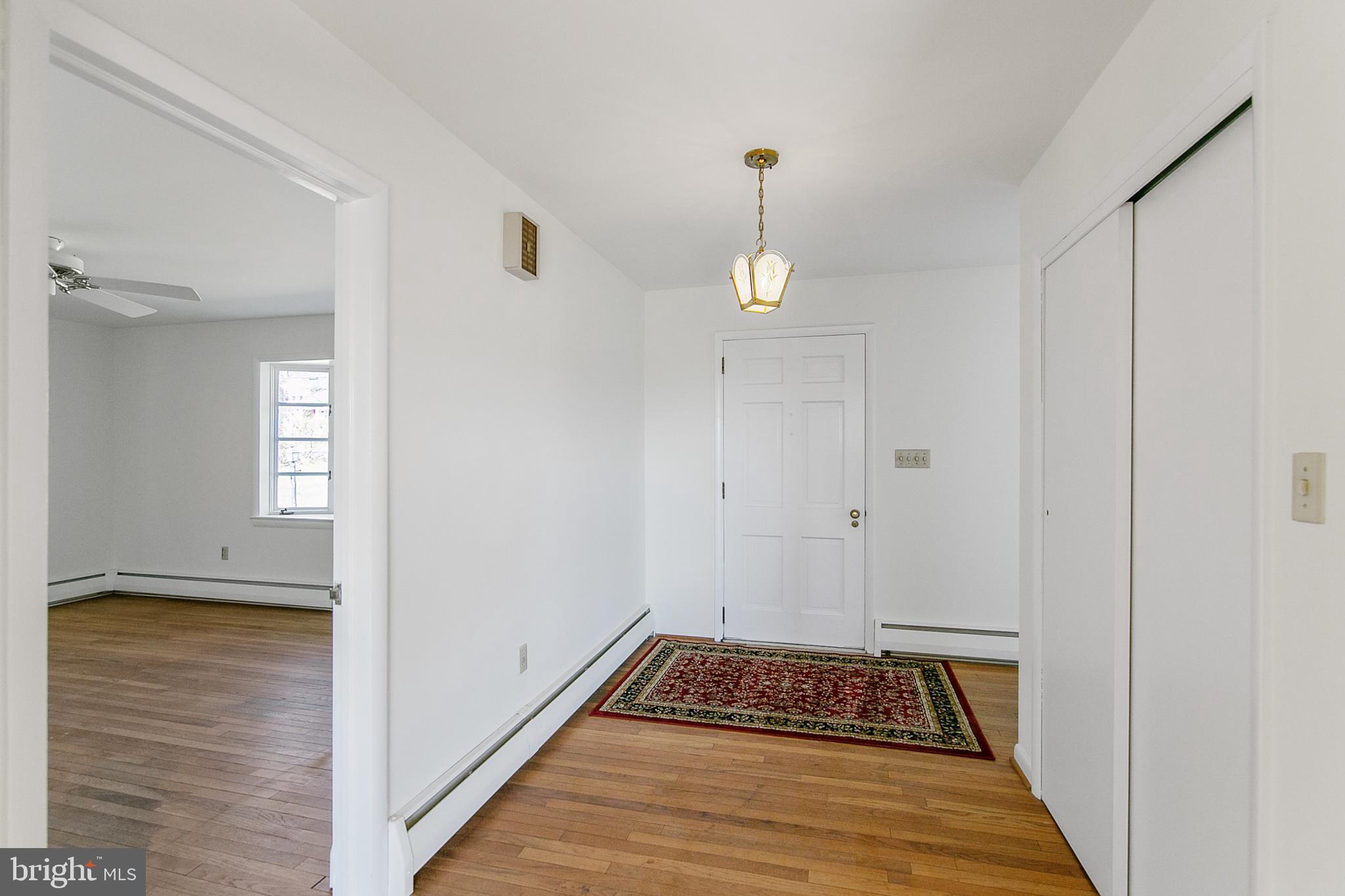 3611 Petersville Road Knoxville, MD 21758 - Photo 9 of 50 HARDWOOD ENTRY FOYER VIEW INTO FAMILY ROOM