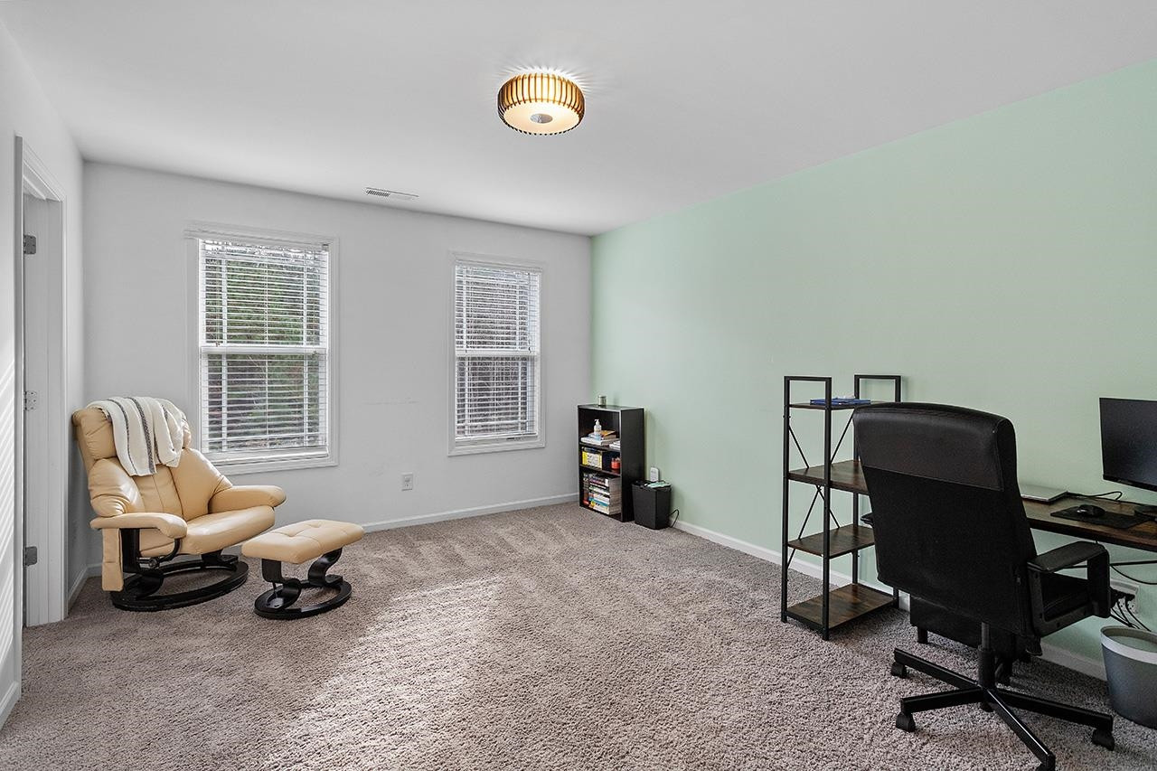 2929 Britmass Drive Raleigh, NC 27616 - Photo 29 of 35 a view of a workspace with furniture and a window