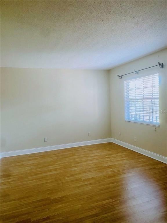 120 South Church Avenue, Unit 209 Tampa, FL 33609 - Photo 4 of 11 a view of an empty room with window