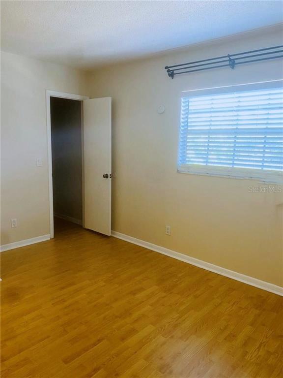 120 South Church Avenue, Unit 209 Tampa, FL 33609 - Photo 5 of 11 a view of an empty room with a window
