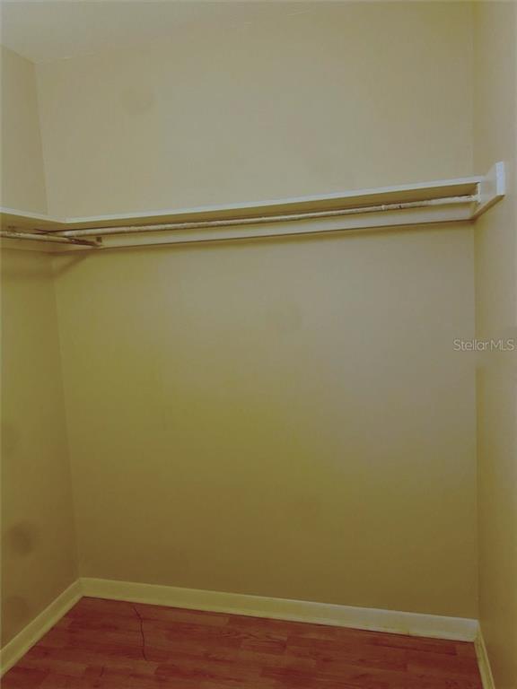 120 South Church Avenue, Unit 209 Tampa, FL 33609 - Photo 8 of 11 a view of a room with wooden floor