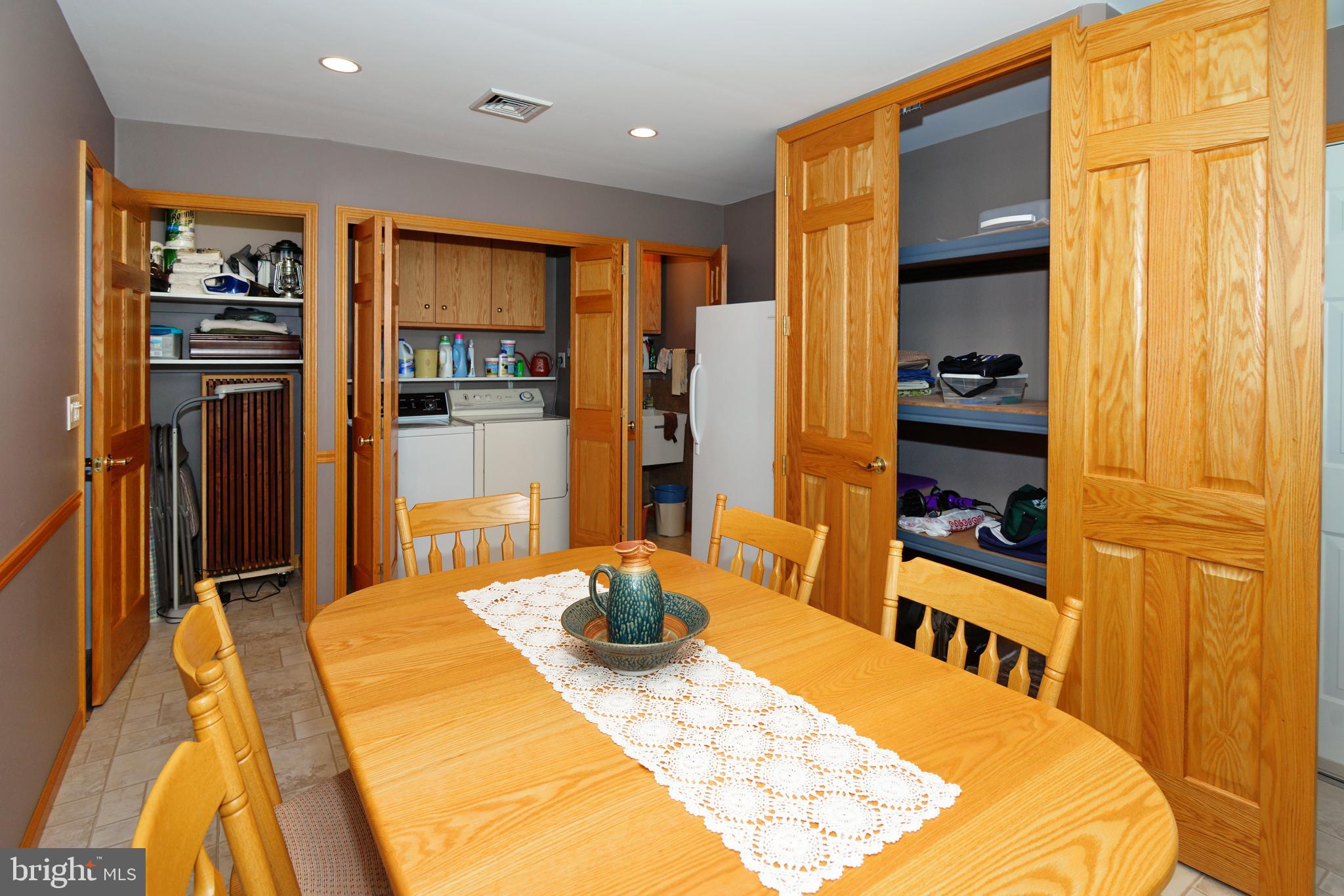 485 Quarry Road Harleysville, PA 19438 - Photo 13 of 37 Dining Room with Laundry Area & Utility Sink