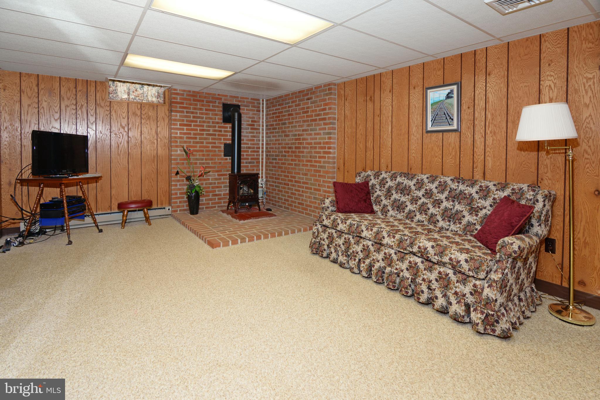 485 Quarry Road Harleysville, PA 19438 - Photo 27 of 37 Finished Basement with Propane Fireplace