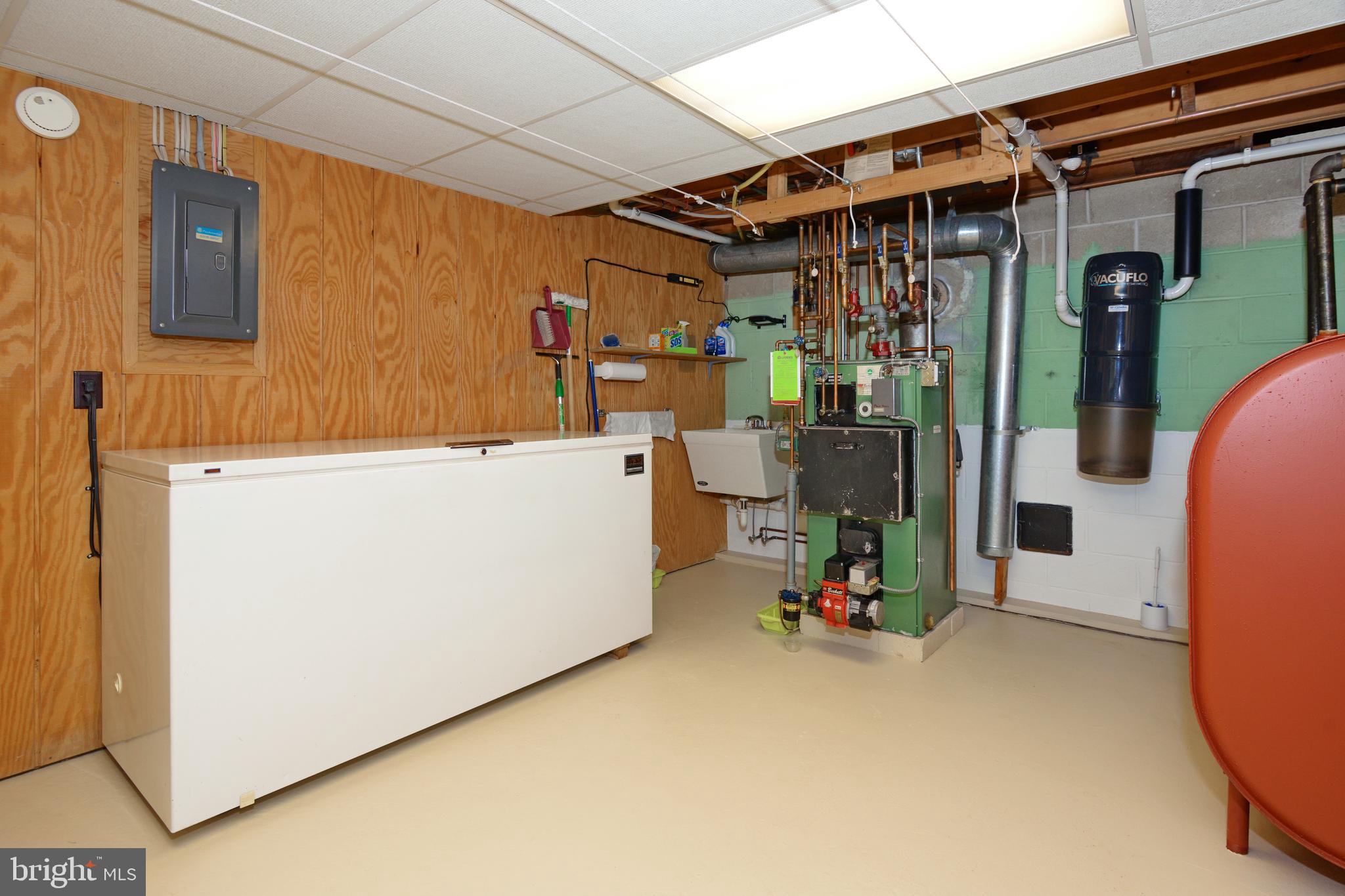 485 Quarry Road Harleysville, PA 19438 - Photo 32 of 37 Utility Area with Sink & Central Vac in Basement