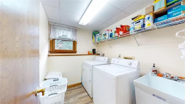 a utility room with dryer and washer