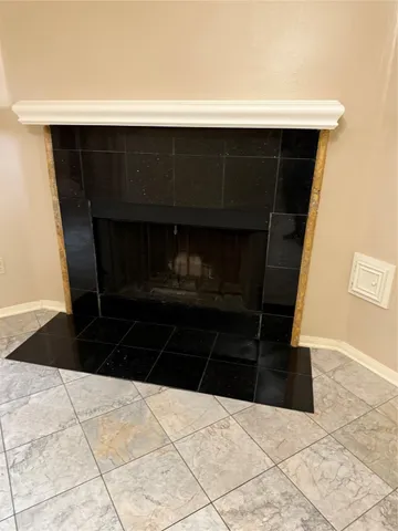 a black and white kitchen with a black white building